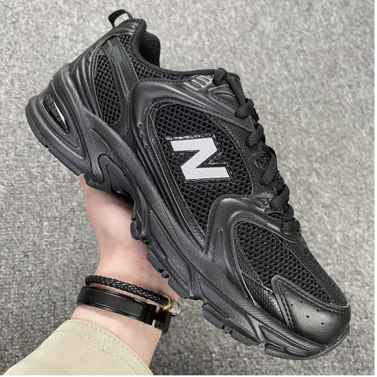 New Balance 530 - Triple Black White Logo