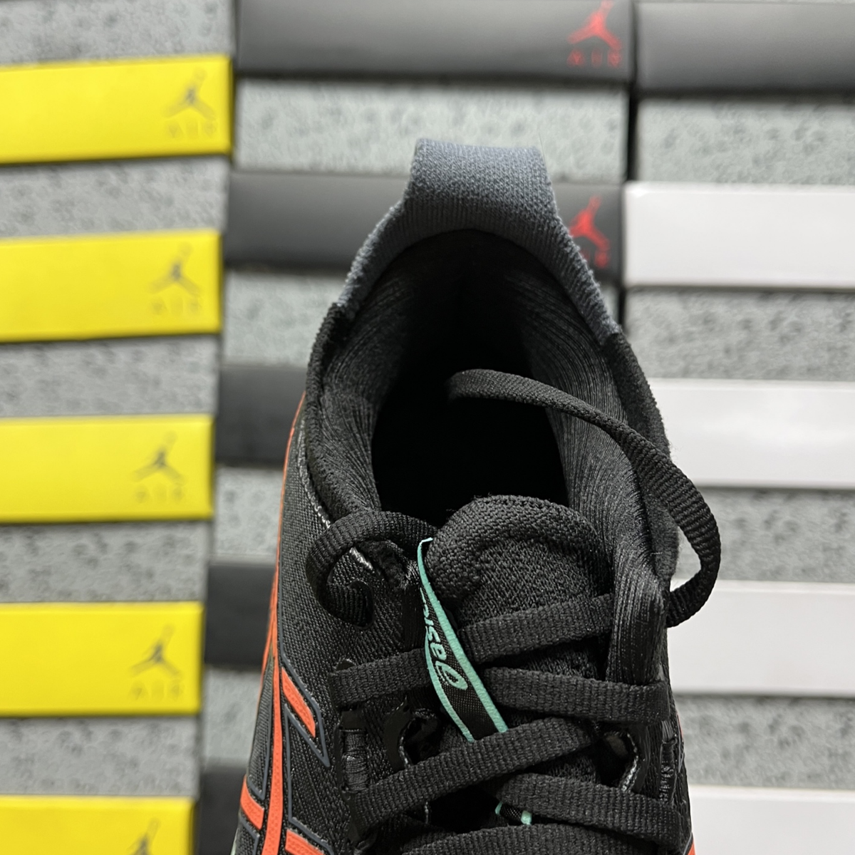 Asics Gel Nimbus 27 - Black / Coral Reef